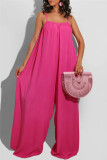 Rose Red Sexy Casual Solid Backless Spaghetti Band Regular Jumpsuits