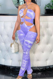 Macacão skinny moda azul celeste com estampa sexy vazada sem costas