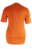Orangefarbenes, modisches, lässiges Plus-Size-Buchstabendruck-Basic-T-Shirt-Kleid mit O-Ausschnitt