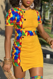 Botones estampados de retazos de moda amarillo contraste asimétrico cuello redondo una línea de vestidos