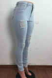 Lichtblauwe Street Solid Ripped Maak oude skinny jeans met middelhoge taille