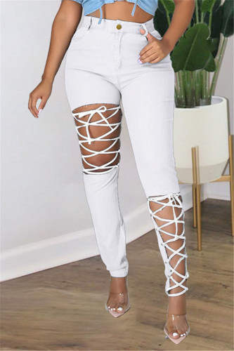 Witte mode casual effen gescheurde bandage jeans met grote maten