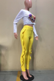 Pantaloni tinta unita giallo casual a balza a vita media skinny a matita