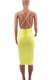 黄色のセクシーな固体包帯パッチワークスパゲッティストラップペンシルスカートドレス