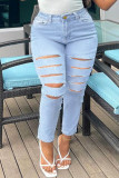 Jeans blu medio alla moda casual strappati tinta unita taglie forti