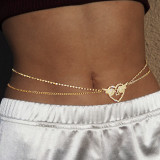 Cadena de cintura de diamantes de imitación perforada de moda dorada