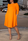 Vestidos de saia bolo com decote em bico e retalhos lisos casuais laranja