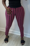 Pantaloni skinny a vita alta con patchwork scozzese sexy rosso rosa. Pantaloni con stampa completa a matita