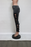 Schwarze, lässige, solide, schmale Denim-Jeans mit mittlerer Taille und Spitze