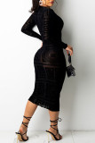 Vestidos de falda lápiz con cuello en O de malla transparente de patchwork ahuecado con estampado sexy negro