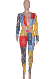Yellow Fashion Sexy Print Bandage Hollowed Out V Neck Skinny Jumpsuits