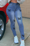 Mittelblaue, modische, lässige, Schmetterlings-Druck-Basic-Jeans mit hoher Taille und normaler Passform