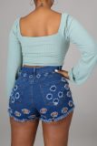 The cowboy blue Sexy Solid Mid Waist Skinny Distressed Hot Pant Ripped Denim Shorts
