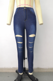 Jeans de mezclilla ajustados de cintura media rasgados sólidos informales azules medianos