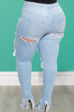 Синие сексуальные однотонные рваные джинсы больших размеров