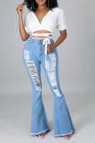 The cowboy blue Sexy Solid Ripped Mid Waist Boot Cut Denim Jeans