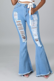 Hellblaue, sexy, solide, zerrissene Denim-Jeans mit mittlerer Taille und Boot-Cut