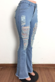 Jeans in denim con taglio a stivaletto a vita media strappati sexy azzurri