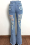 Jeans jeans azul claro sexy com rasgo e cintura média com corte de bota
