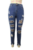 Donkerblauwe jeans met grote maten luipaardprint en luipaardprint