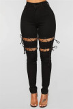 Zwarte mode casual effen gescheurde bandage skinny jeans met hoge taille
