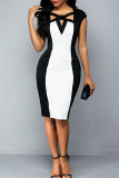 黒と白の英国スタイルのソリッドホローアウトパッチワーク結び目非対称カラーストレートドレス