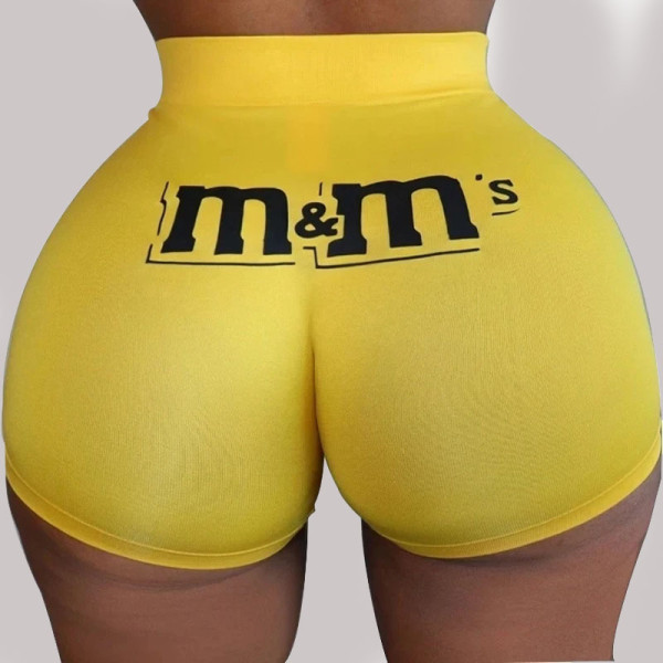 Pantaloni corti dritti con stampa elasticizzata gialla