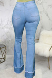 Dunkelblaue Street-Jeans mit zerrissenem Patchwork und hoher Taille