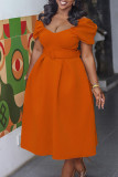 Оранжевые модные знаменитости Твердые лоскутные платья с V-образным вырезом и трапециевидной линией