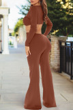 Burgundy Sexy Solid Hollowed Out Patchwork V Neck Regular Jumpsuits