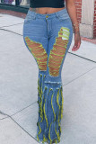 Jeans in denim a vita alta strappati con patchwork di strada alla moda mimetica