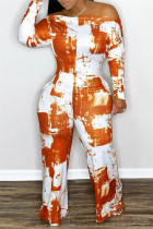 オレンジ色のファッションカジュアルプリントバックレスオフショルダーレギュラージャンプスーツ
