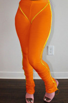Orangefarbene, modische, lässige, solide Patchwork-Falten-Röhrenhose mit hoher Taille
