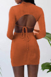 Orange Fashion Sexy Solid Hollowed Out O Neck One Step Skirt Dresses