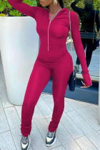 Roze mode-straat effen patchwork jumpsuits met ritssluiting en kraag