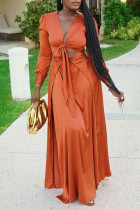 オレンジ色のファッションソリッド包帯くり抜かれたVネック長袖ドレス