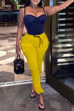 Gelbe, einfarbige Harlan-Hose im Patchwork-Stil mit mittlerer Taille und Street-Print