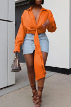 オレンジファッションカジュアルソリッド包帯ターンダウンカラートップス