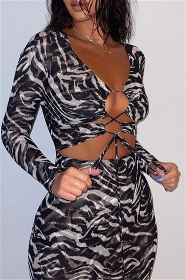 Zwarte mode sexy print bandage uitgeholde jurken met lange mouwen