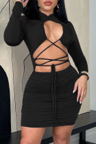 Schwarze Mode Sexy Solide Ausgehöhlte Langarmkleider mit O-Ausschnitt