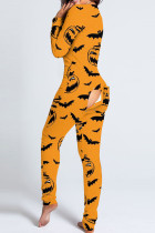 Oranje punkprint patchwork skinny jumpsuit met V-hals