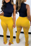 Pantalones pitillo de cintura alta con abertura sólida casuales de moda amarillos