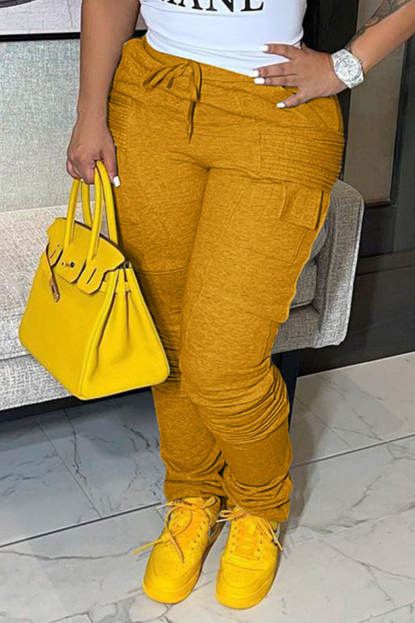 Pantalones casuales de patchwork liso con bolsillo regular de cintura alta naranja