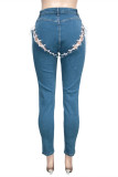 Jeans in denim regolari a vita alta patchwork scavati con fasciatura solida casual alla moda blu