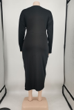 Черное сексуальное однотонное платье в стиле пэчворк с круглым вырезом