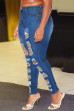 Donkerblauwe straat effen gescheurde jeans met oude patchwork en hoge taille