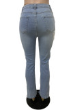 Голубые однотонные джинсы из денима обычного цвета с рваными разрезами и высокой талией