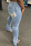 Hellblaue, einfarbige, zerrissene Schlitz-Jeans mit hoher Taille und regulärer Passform
