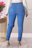 Blaue, einfarbige Street-Jeans mit zerrissenem Make-up-Patchwork und normaler hoher Taille