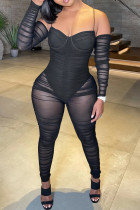 Macacão skinny preto fashion sexy patchwork sólido transparente sem costas com alça de espaguete